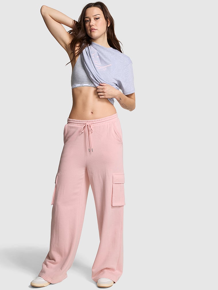 PINK Ivy Fleece Wide-Leg Cargo Sweatpants , Dollhouse, onModelFront, 1 of 5 Sofia is 5'10" or 178cm and wears Small