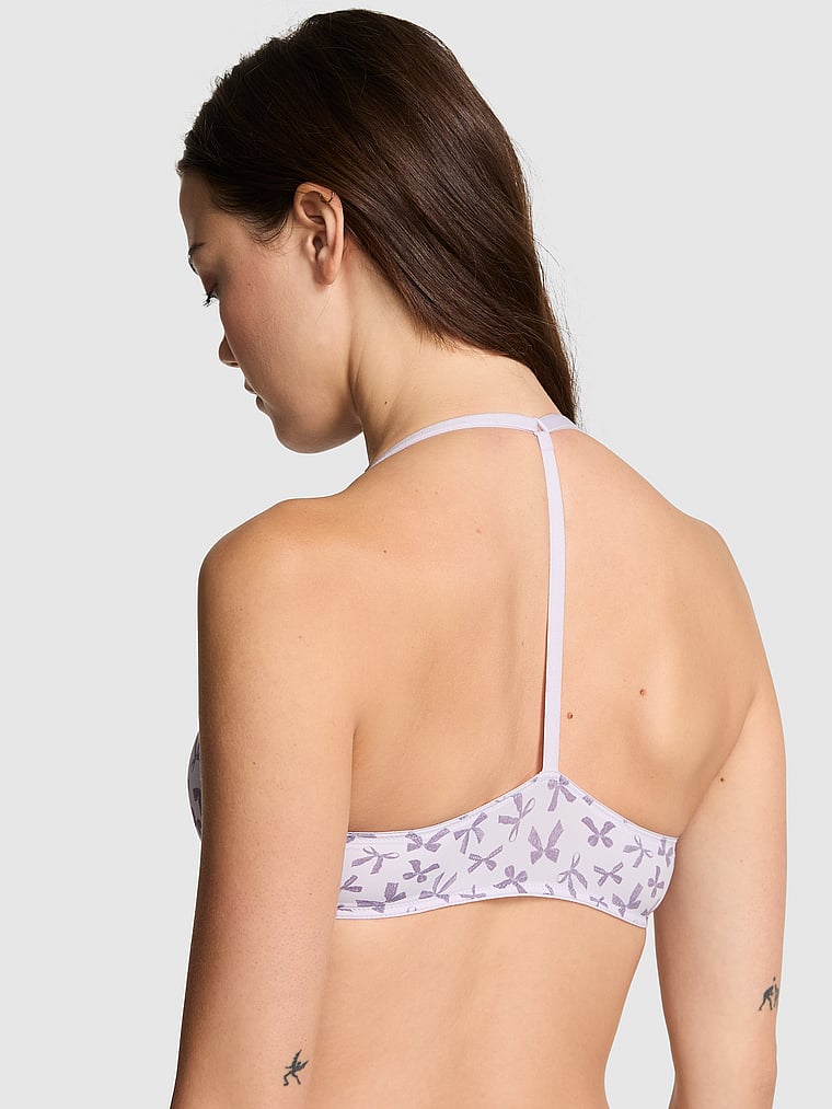 PINK Wear Everywhere Wear Everywhere Push-Up Bra, Purple Whisper Lace Bow Print, onModelBack, 2 of 3 Sofia is 5'10" or 178cm and wears 34B or Small