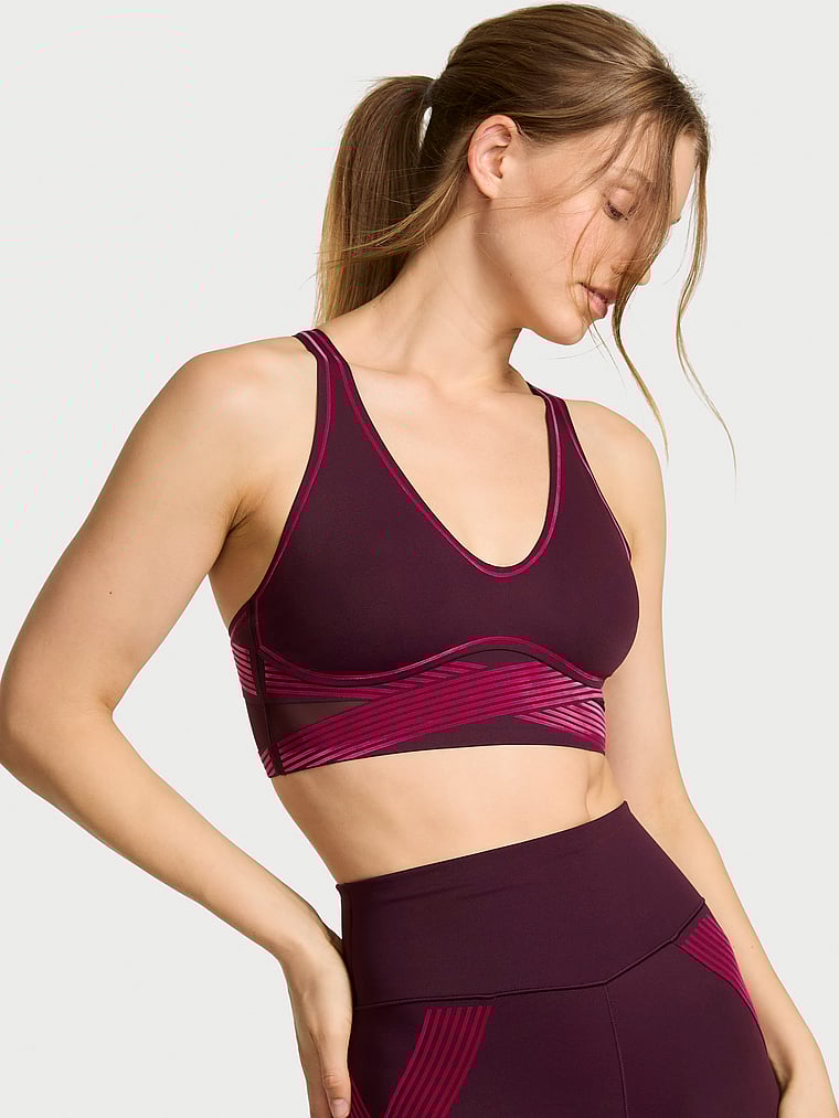 Victoria's Secret, VSX VSX Elevate™ Refined Contours Plunge Sports Bra, Winter Wine, onModelFront, 1 of 5 Lotta is 5'10" or 178cm and wears 34B or Small