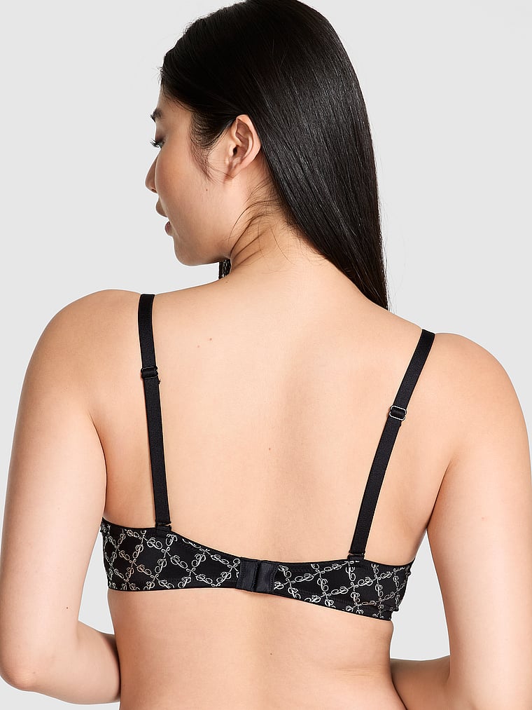 PINK Wear Everywhere Wear Everywhere Lightly Lined Full Coverage T-Shirt Bra, Black Script Bow Print Shine, onModelBack, 2 of 3 Gloria is 5'9" or 175cm and wears 34D or Small