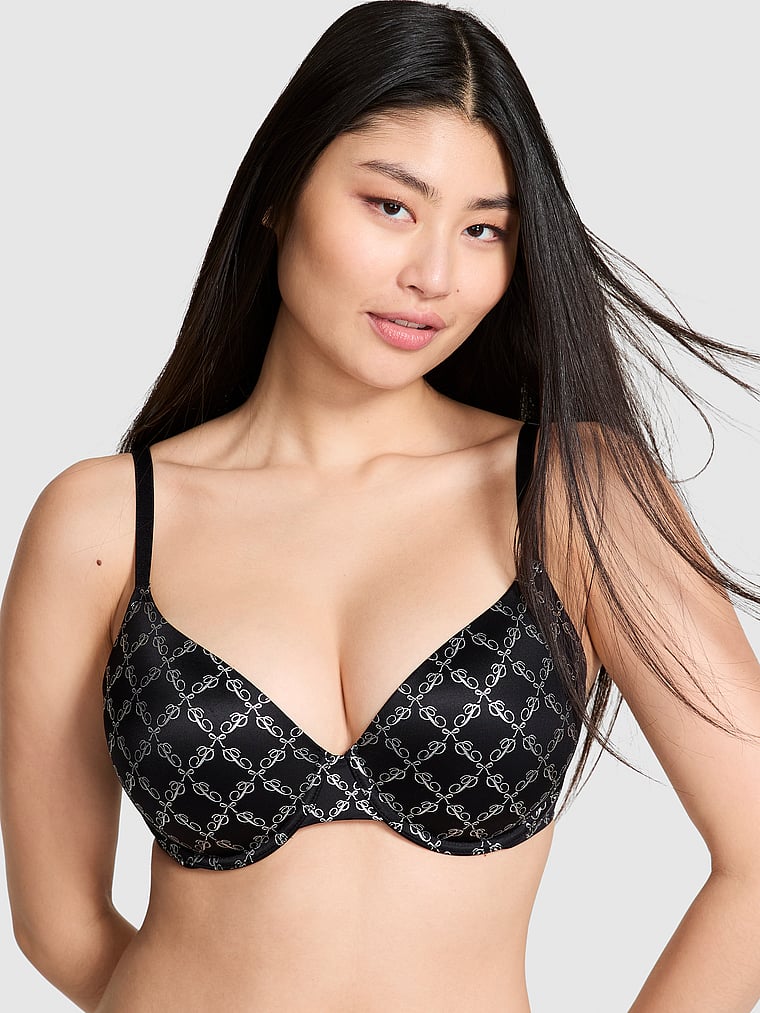 PINK Wear Everywhere Wear Everywhere Lightly Lined Full Coverage T-Shirt Bra, Black Script Bow Print Shine, onModelFront, 1 of 3 Gloria is 5'9" or 175cm and wears 34D or Small