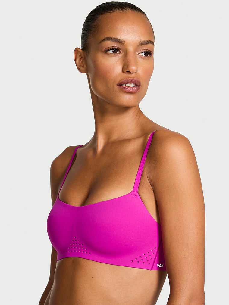 Victoria's Secret, VSX VSX Featherweight™ Light Balconette Sports Bra, Berrylicious, onModelFront, 1 of 5 Nikita  is 5'10" or 178cm and wears 34B or Small