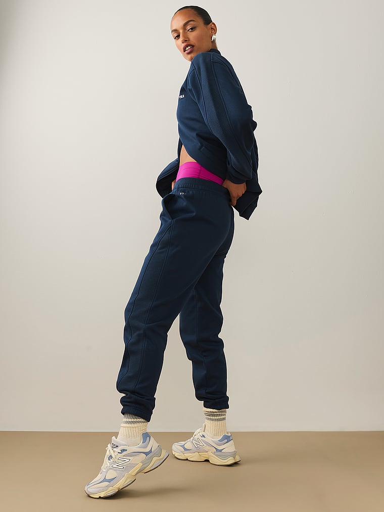 Victoria's Secret, VSX VSX Movement Fleece Relaxed Jogger, Impact Blue, onModelSide, 1 of 5 Nikita  is 5'10" or 178cm and wears Small