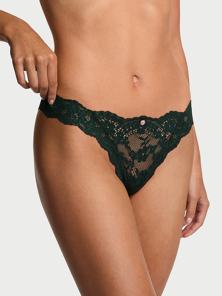Victoria's Secret, Dream Angels Pom Pom Bow Thong Panty, Cilantro, onModelFront, 1 of 4 Maia is 5'9" or 175cm and wears Small