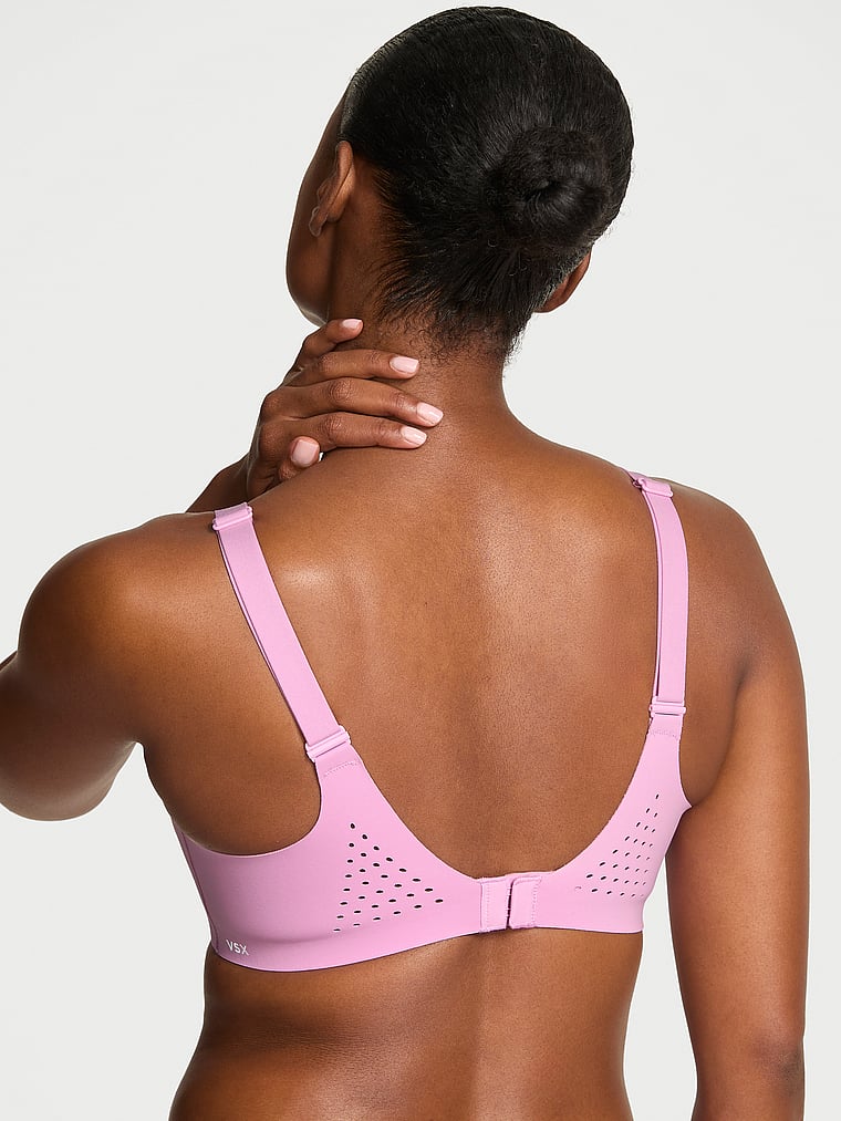 Victoria's Secret, VSX VSX Featherweight™ Medium V-Neck Sports Bra, Bikini Pink, onModelBack, 2 of 2 Tsheca  is 5'9" or 175cm and wears 34B or Small