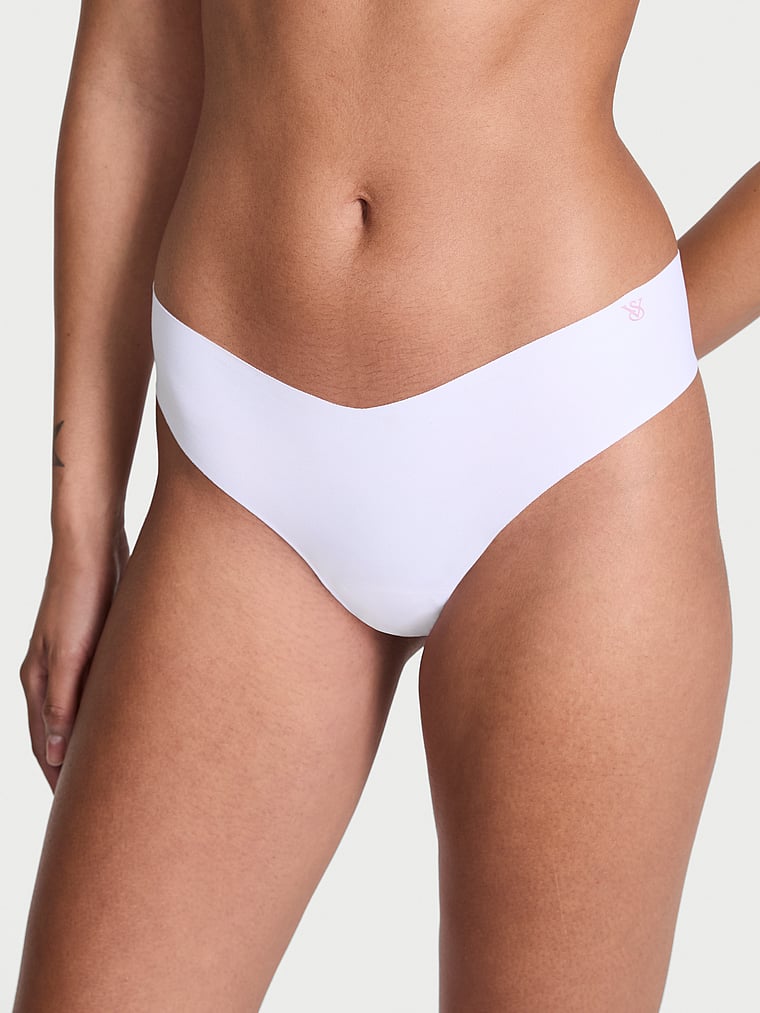 Victoria's Secret, No-Show No-Show Thong Panty, VS White, onModelFront, 1 of 3 Anisha is 5'11" and wears Small