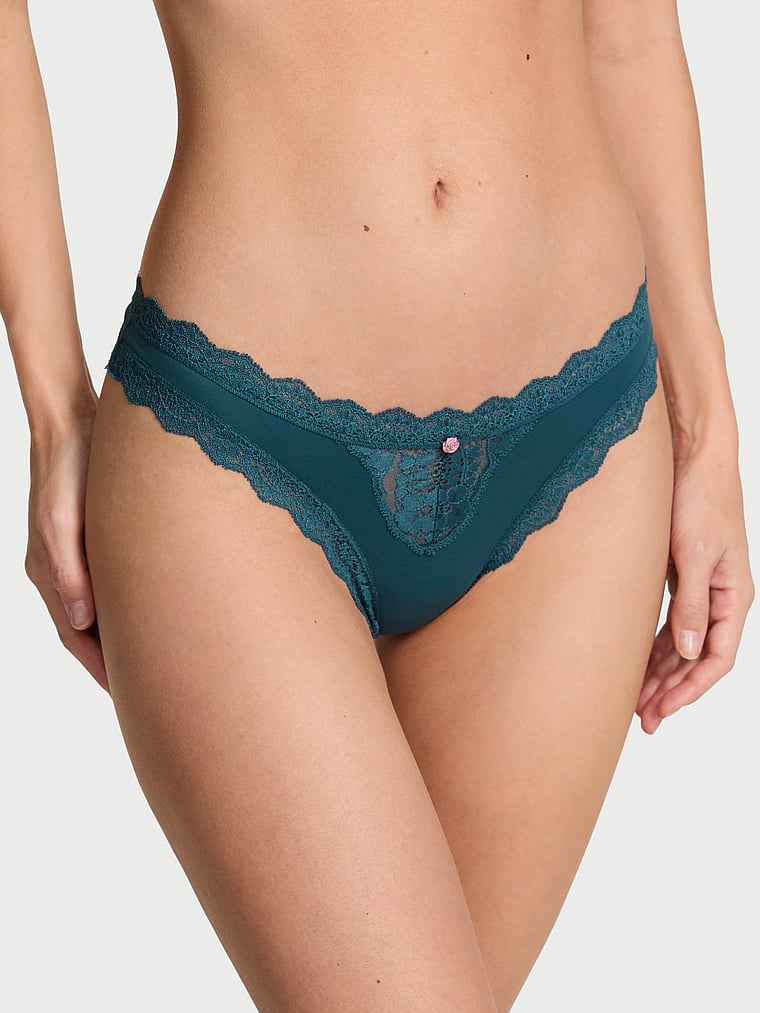 Victoria's Secret, Dream Angels Lace-Trim Thong Panty, Teal Haze, onModelFront, 1 of 4 Maggie is 5'7" or 170cm and wears Small