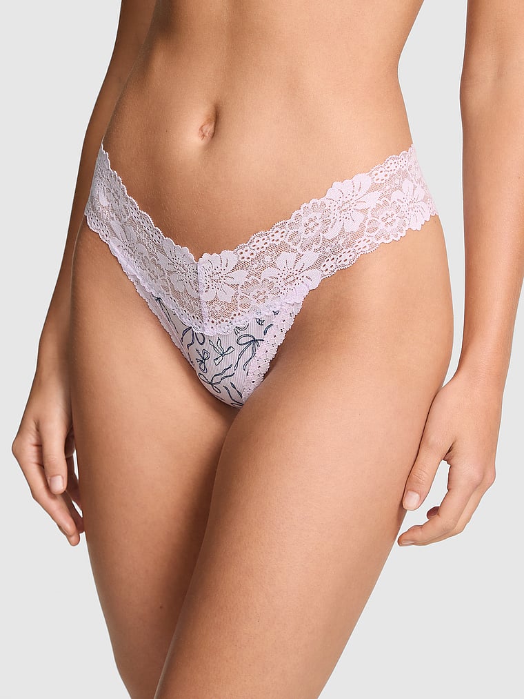 PINK PINK Wink™ Lace-Trim Thong Panty, Purple Whisper Bow Print, onModelFront, 1 of 3 Mari is 5'7" and wears Small