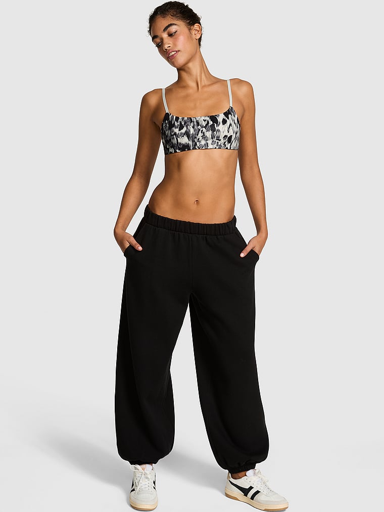PINK Relay Square-Neck Sports Bra, Snow Leopard Foil, onModelFront, 3 of 4 Vanessa is 5'10" and wears 32B or Small