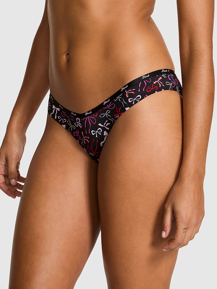 PINK Logo Cotton Tanga Panty, Black Bow Print, onModelFront, 1 of 3 Vanessa is 5'10" or 178cm and wears Small