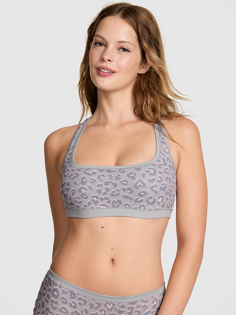 PINK Cotton Dorm Unlined Racerback Bralette, Grey Leopard, onModelFront, 1 of 4 Taylor is 5'8" or 173cm and wears 32B or Small