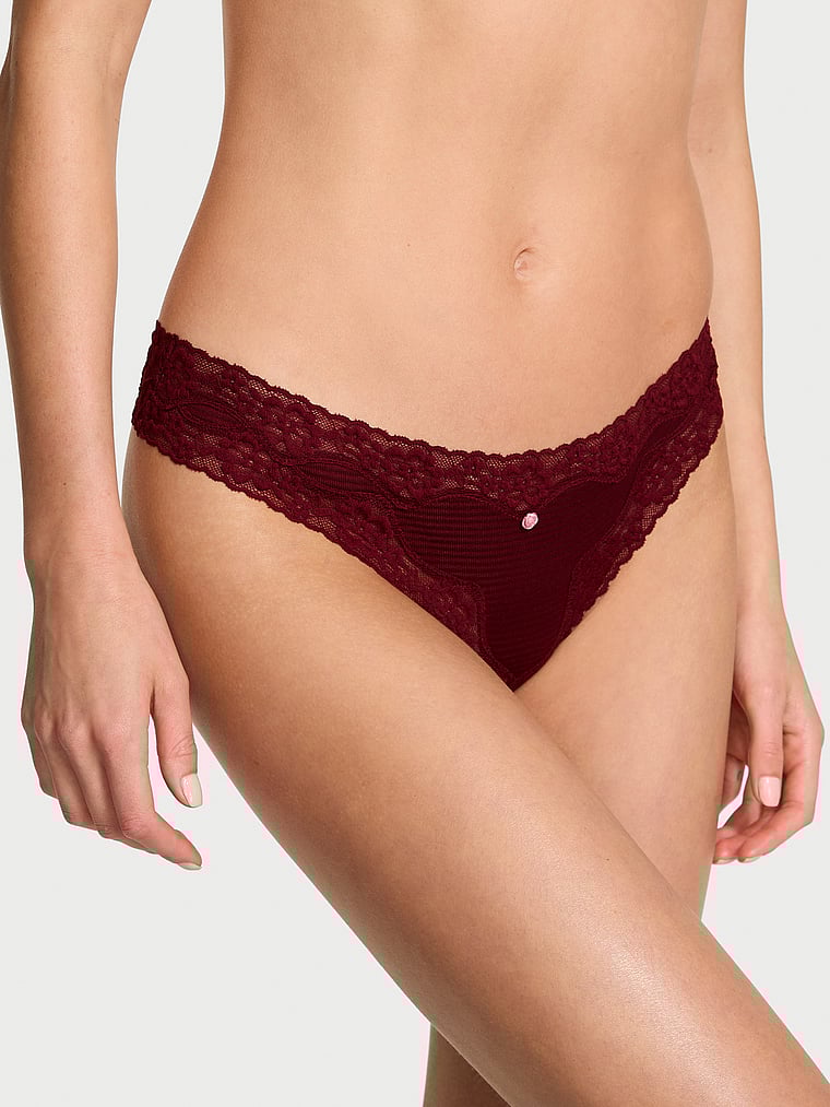 Victoria's Secret, Lace Trim Cotton Shadow Stripe Lace-Waist Thong Panty, Sangria Red, onModelFront, 1 of 2 Aga is 5'10" or 178cm and wears Small
