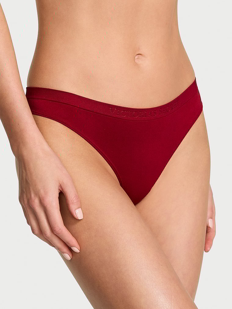 Victoria's Secret, Seamless Seamless Shine Thong Panty, Red Lacquer, onModelFront, 1 of 3 Aga is 5'10" or 178cm and wears Small