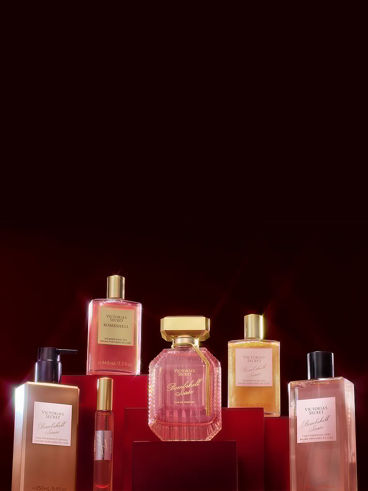 Victoria's Secret, Fine Fragrance Bombshell Soirée Fine Fragrance Lotion, onModelSide, 3 of 4