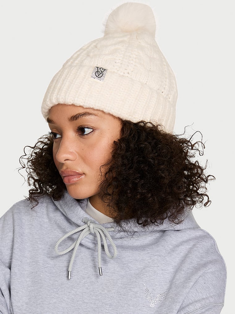 Victoria's Secret, Victoria's Secret Cozy Cable-Knit Pom Beanie, Swan Studs, onModelSide, 1 of 2