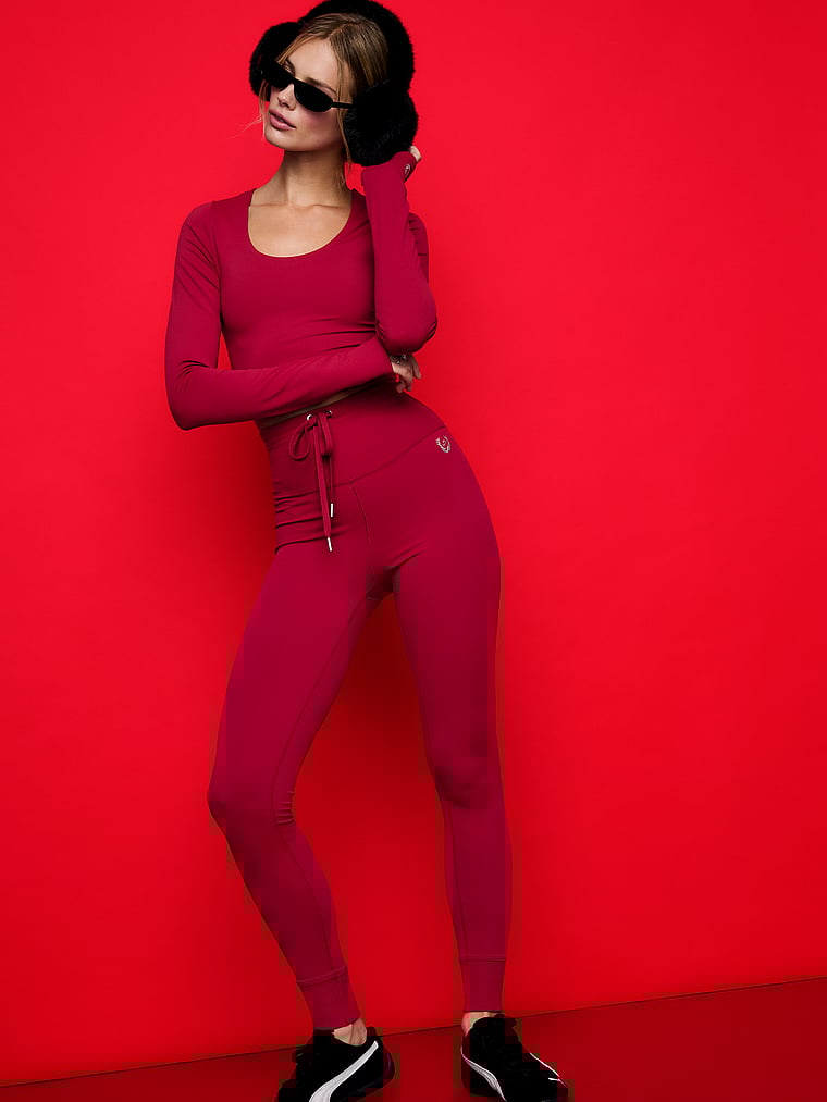 PINK Relay Scoop Long-Sleeve Top, Red Lacquer, onModelSide, 1 of 3 Mari is 5'7" or 170cm and wears Small