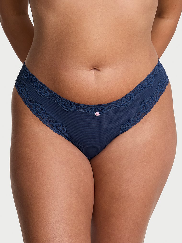 Victoria's Secret, Lace Trim Cotton Lace-Trim Sparkle Thong Panty, Ink Blue, onModelFront, 1 of 2 Karmi is 5'10" or 178cm and wears Large