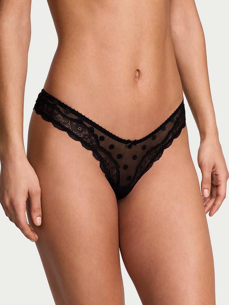 Victoria's Secret, Victoria's Secret Tease Mesh Lace-Trim High-Leg Thong Panty, Black, onModelFront, 1 of 2 Nikita is 5'10" and wears Small