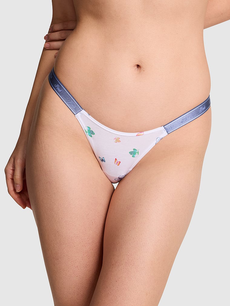 PINK Logo Cotton String Micro Thong Panty, White Multi Color Butterfly Print, onModelFront, 1 of 3