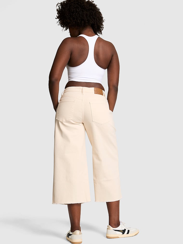 PINK Denim by PINK Mid-Rise Baggy Wide-Leg Cropped Jeans, Vanilla Frost, onModelBack, 2 of 2 Fanta is 5'11" and wears Medium