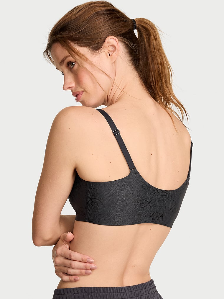 Victoria's Secret, VSX VSX LUXShine Logo Stretch-Comfort Sports Bra, Classic Dark Smoke, onModelBack, 2 of 4 Maggie is 5'7" and wears 32B or Small