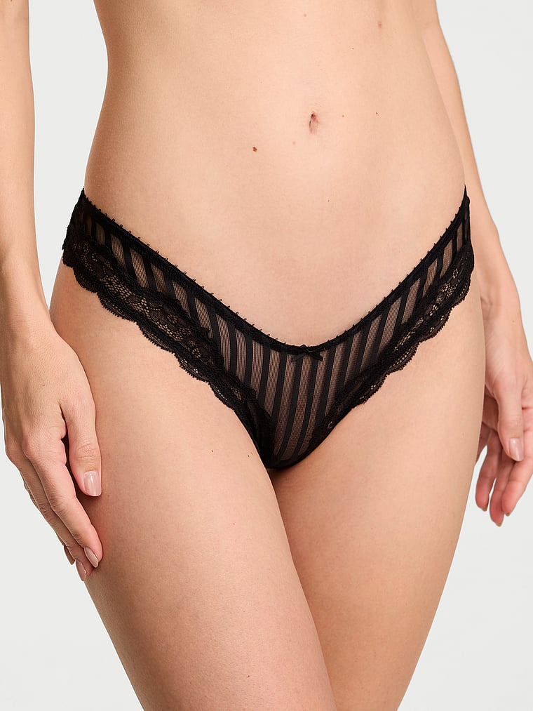 Victoria's Secret, Victoria's Secret Tease Mesh Lace-Trim High-Leg Thong Panty, Black, onModelFront, 1 of 3 Maggie is 5'7" and wears Small