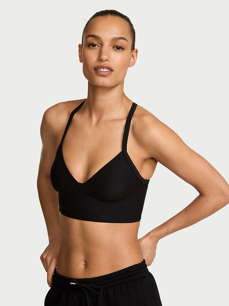 Victoria's Secret, VSX VSX LUXMarl™ Racerback Sports Bra, Heather Black, onModelFront, 1 of 3 Nikita is 5'10" and wears 34B or Small