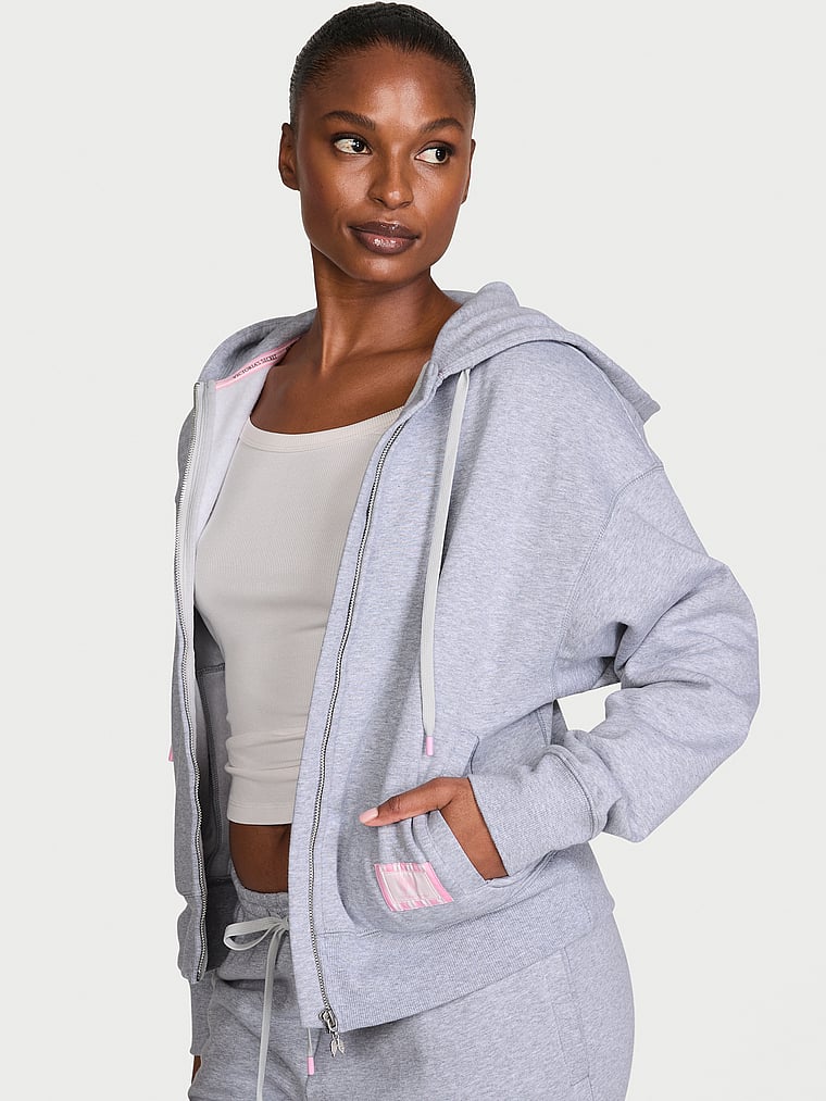 Victoria's Secret, Angel Essentials Iconic Fleece Full-Zip Hoodie, Medium Heather Grey, onModelFront, 1 of 3 Tsheca is 5'9" and wears Small