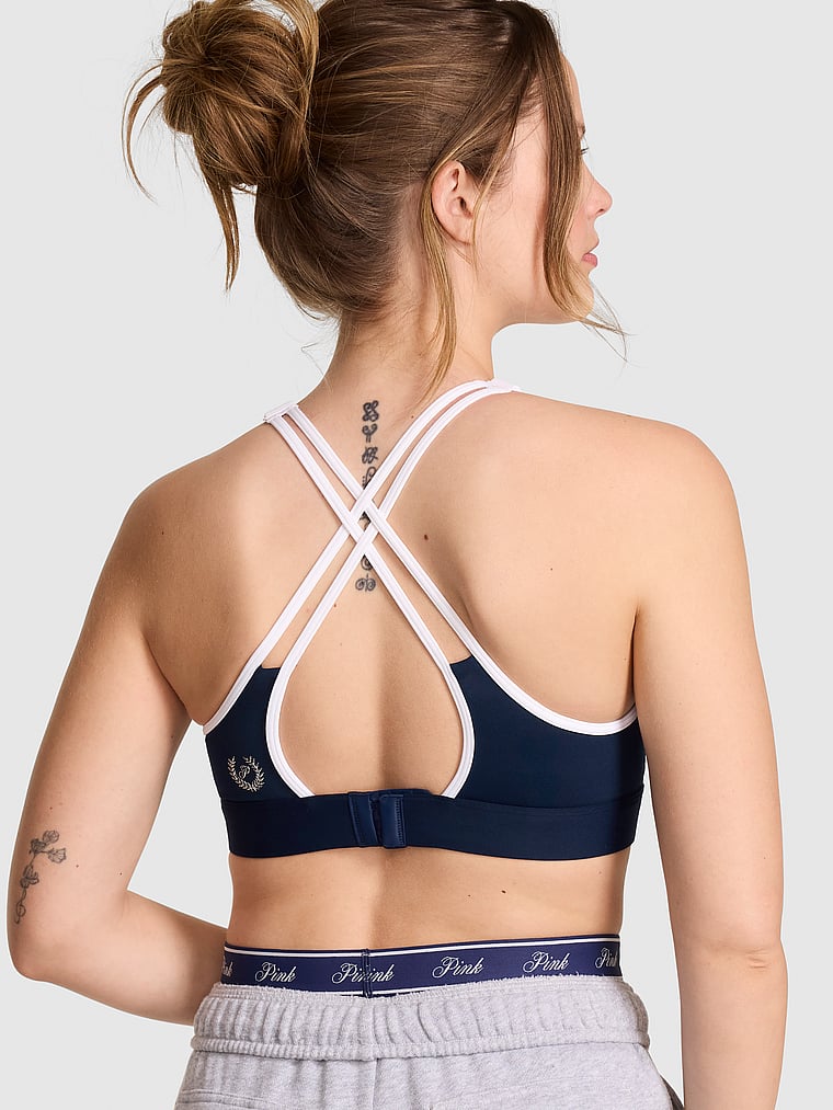 PINK PINK Relay™ Strappy Medium-Support Sports Bra, Noir Navy, onModelBack, 3 of 4 Taylor is 5'8" or 173cm and wears 32B or Small