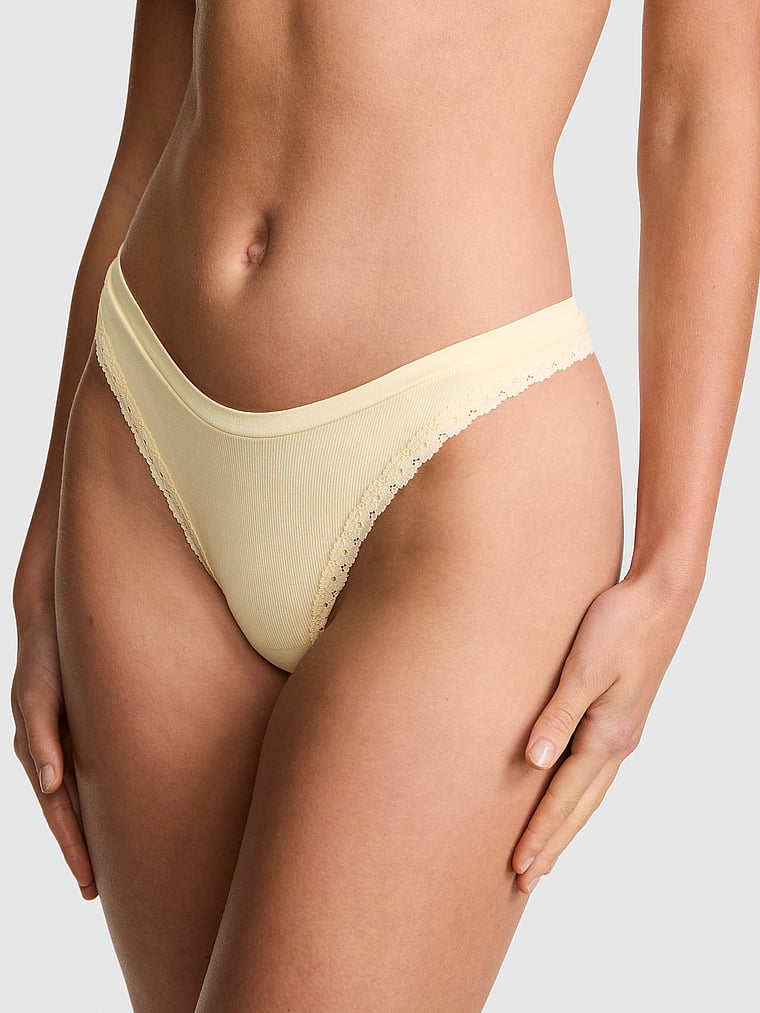 PINK Seamless High-Leg Thong Panty, Palest Yellow, onModelFront, 1 of 3 Mari is 5'7" and wears Small