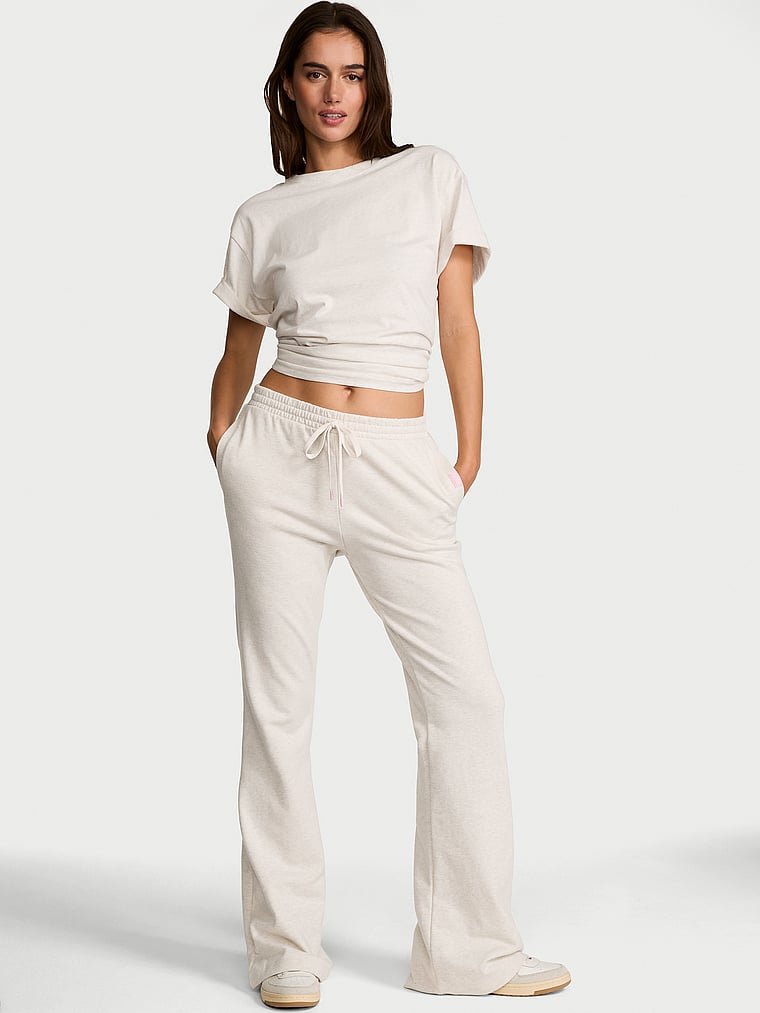 Victoria's Secret, Angel Essentials Off-Duty Terry Flare Sweatpant, Heather Natural, onModelFront, 1 of 3 Maia is 5'9" or 175cm and wears Small