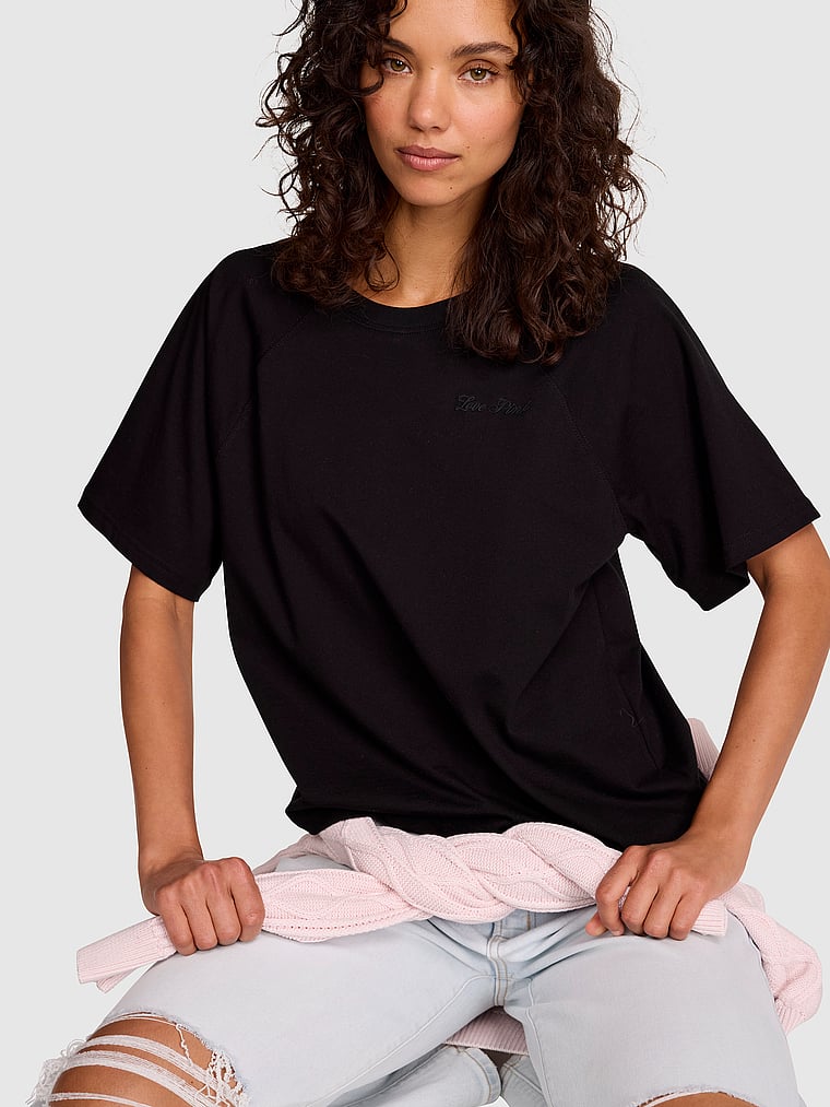 PINK Campus Cotton™ Raglan Tee, Pure Black, onModelFront, 1 of 3 Rae is 5'10" and wears Small