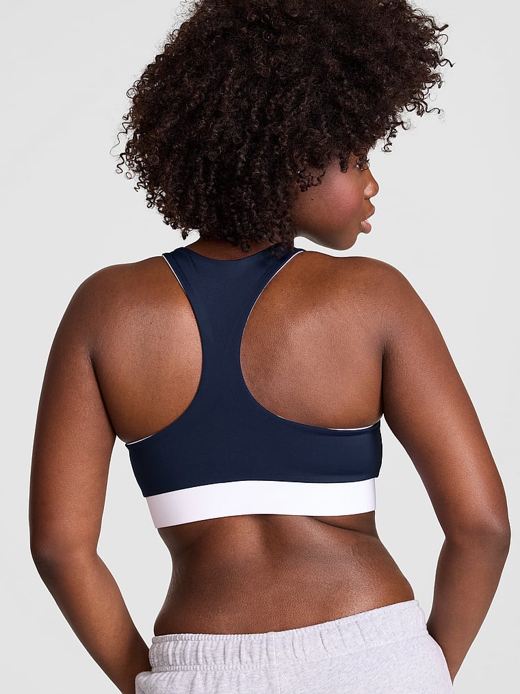 PINK PINK Relay™ Racerback Sports Bra, Noir Navy, onModelBack, 2 of 3 Fanta is 5'11" and wears 34D or Medium