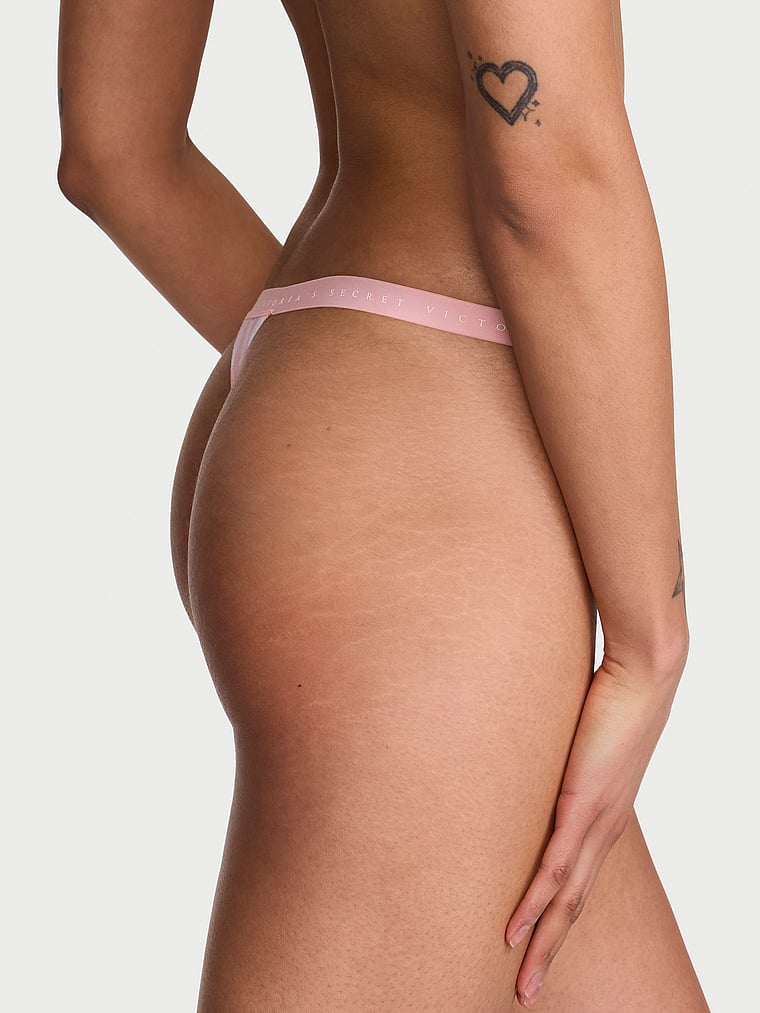 Victoria's Secret, Victoria's Secret Stretch Cotton V-String Panty, Pink Iconic Martini Stripes, onModelBack, 2 of 3 Anisha is 5'11" and wears Small