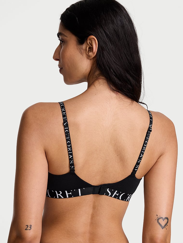 Victoria's Secret, The T-shirt Lightly Lined Wireless Bra, Black, onModelBack, 2 of 2 Anisha is 5'11" or 180cm and wears 34B or Small