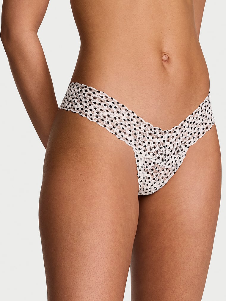 Victoria's Secret, The Lacie Lace Lace-Up Thong Panty, Coconut White Dots, onModelFront, 1 of 3 Nisaa is 5'9" or 175cm and wears Small