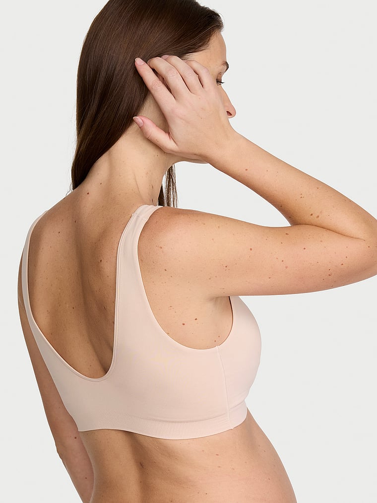Victoria's Secret, Invisible by Victoria’s Secret Seamless Plunge Pumping Bra, Marzipan, onModelBack, 2 of 3 Regitze is 5'10" and wears 34C or Medium