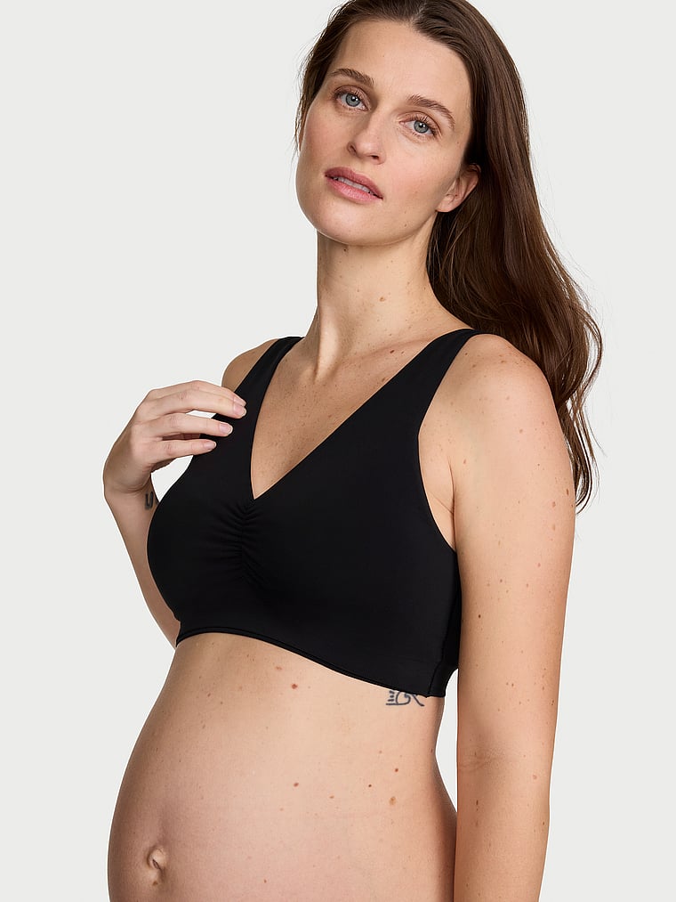 Victoria's Secret, Victoria's Secret Bare Seamless Plunge Pumping Bra, Black, onModelFront, 1 of 3 Regitze is 5'10" and wears 34C or Medium