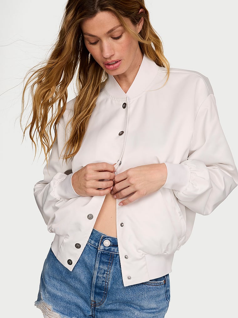 Victoria's Secret, Angel Essentials Bridal Satin Shine Baseball Jacket, Coconut White, onModelFront, 1 of 3 Maggie is 5'7" and wears Small