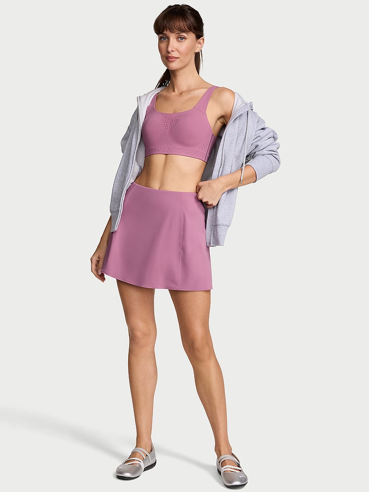 Victoria's Secret, VSX VSX Elevate™ Mini Skirt, Violet Frost, onModelFront, 1 of 2 Ari is 5'9" or 175cm and wears Small
