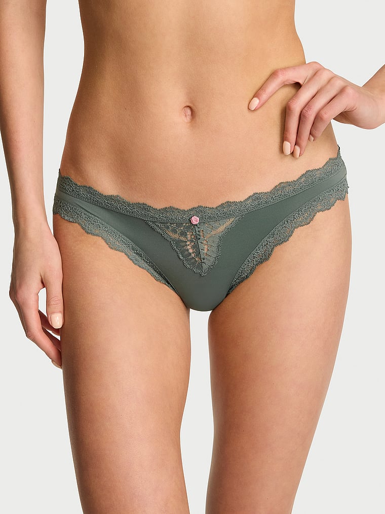 Victoria's Secret, Dream Angels Lace-Trim String Bikini Panty, Faded Sage, onModelFront, 3 of 4 Aga is 5'10" and wears Small