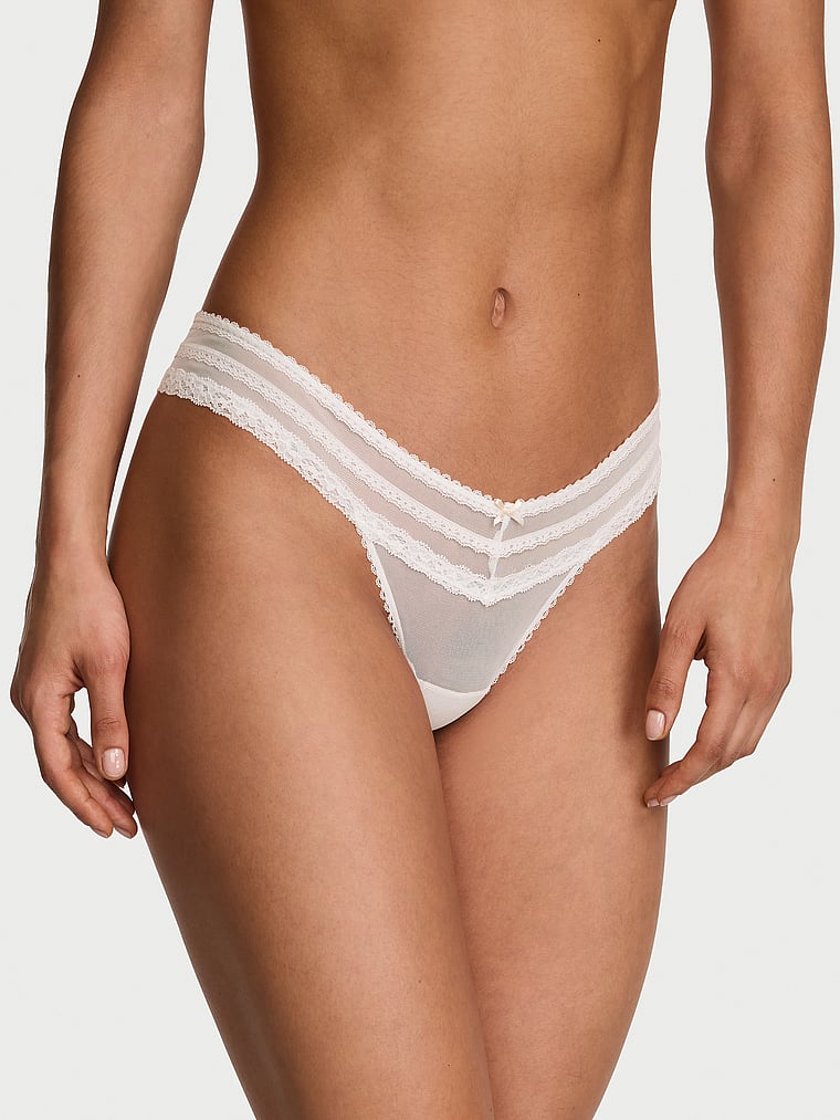 Victoria's Secret, Dream Angels Lace Rhinestone Heart Hardware Brazilian Panty, Coconut White, onModelFront, 1 of 3 Nikita is 5'10" and wears Small