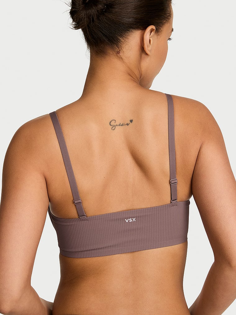 Victoria's Secret, VSX VSX Elevate™ Rib Ruched Sports Bra, Cloudy Grey, onModelBack, 2 of 3 Nisaa is 5'9" and wears 34B or Small