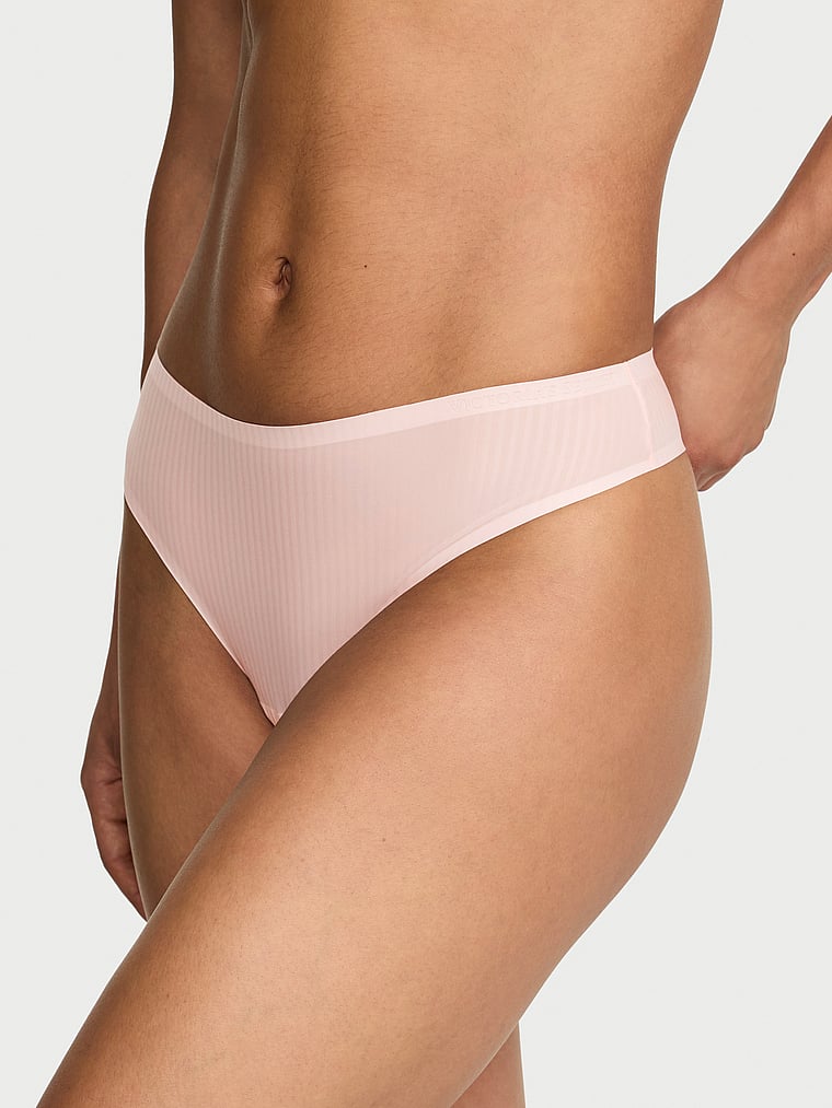 Victoria's Secret, Body by Victoria Body by Victoria Flex Lace-Trim Mid-Rise Thong Panty, Purest Pink, onModelFront, 1 of 3 Nikita is 5'10" and wears Small