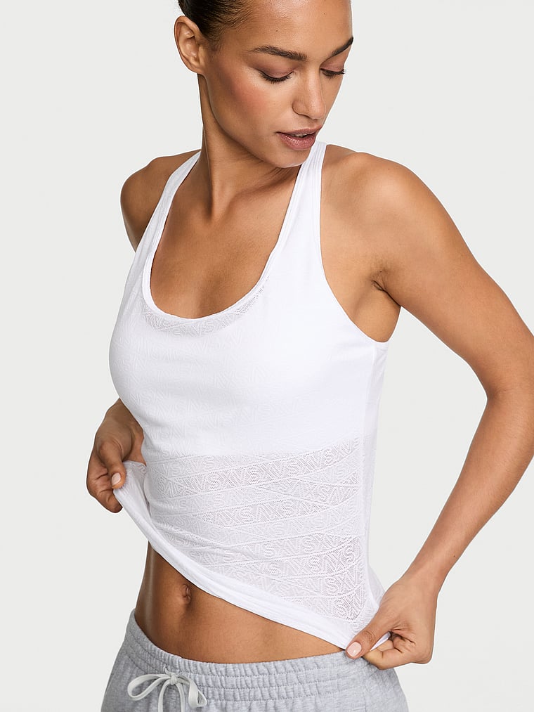 Victoria's Secret, VSX VSX Logo Lace Tank Top, VS White, onModelFront, 1 of 3 Nikita  is 5'10" and wears Small