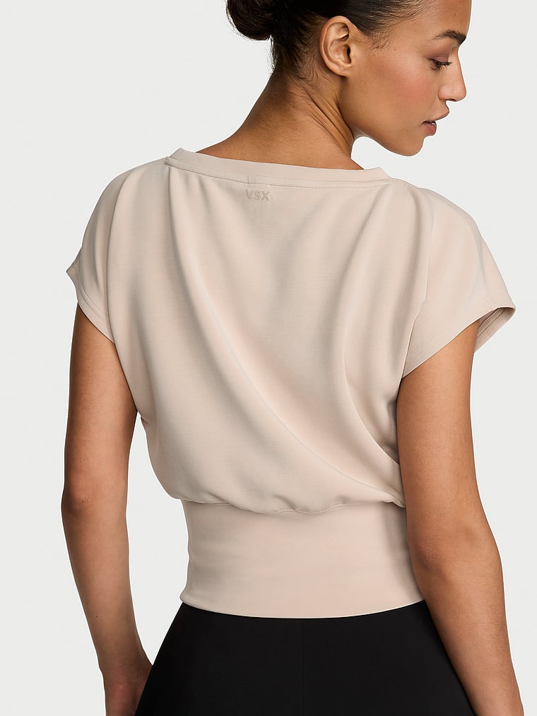 Victoria's Secret, VSX Featherweight Knit Short-Sleeve Top, Oyster, onModelBack, 2 of 3 Nikita  is 5'10" or 178cm and wears Small