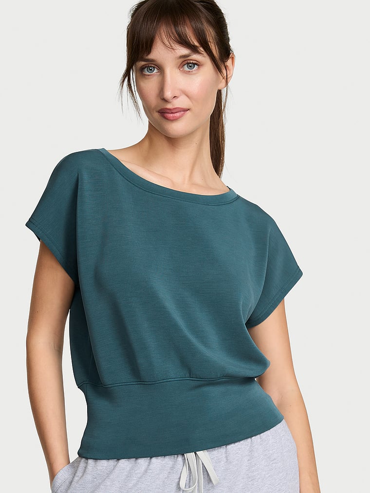 Victoria's Secret, VSX Featherweight Knit Short-Sleeve Top, Teal Haze, onModelFront, 1 of 3 Ari is 5'9" or 175cm and wears Small