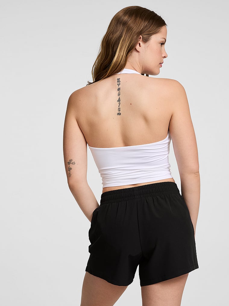 PINK Tech Woven Front-Slit Run Shorts, Pure Black, onModelBack, 2 of 3 Taylor is 5'8" or 173cm and wears Small