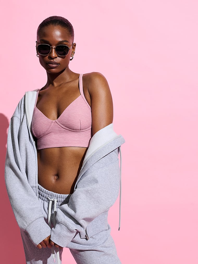 Victoria's Secret, VSX VSX New Essential Racerback Sports Bra, Heather Dusk Pink, onModelFront, 1 of 4 Tsheca  is 5'9" and wears 34B or Small