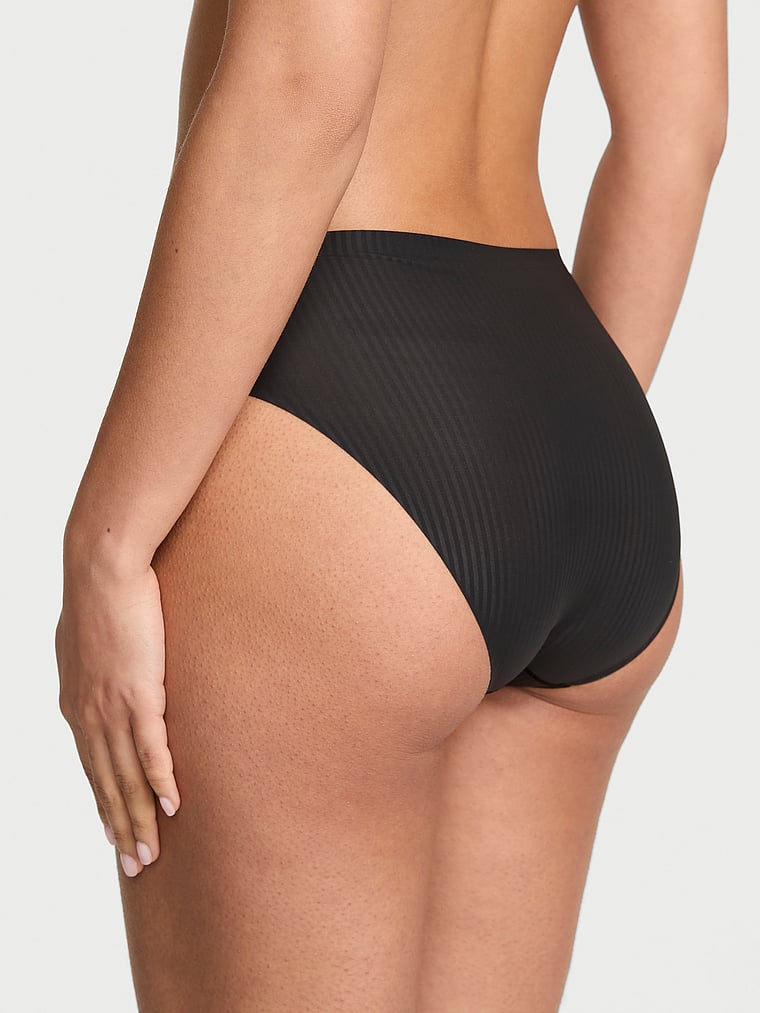 Victoria's Secret, Body by Victoria Body by Victoria Flex Mid-Rise Bikini Panty, Black, onModelBack, 2 of 4 Nisaa is 5'9" and wears Small